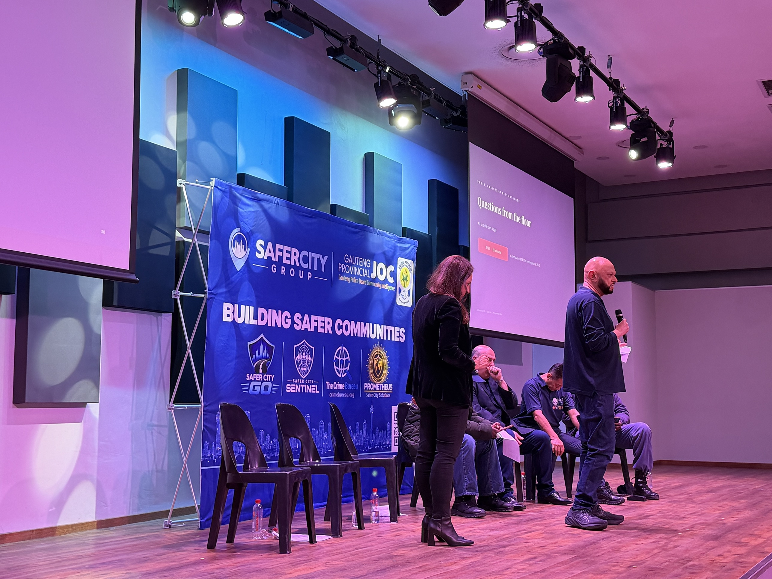 Questions from the floor — the panel takes questions at the Building Safer Communities meeting